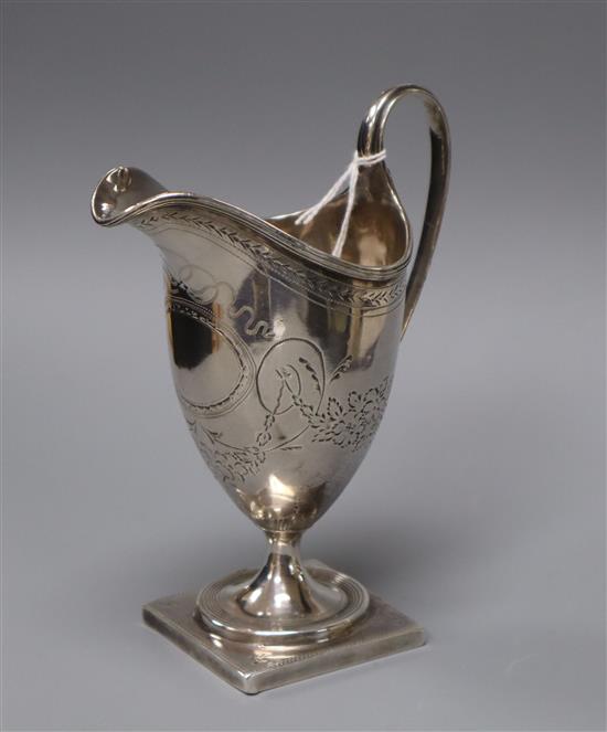 A George III silver cream jug, London, 1794, 14.5cm.
